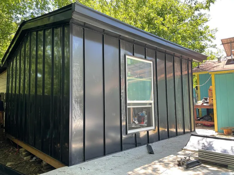 Black standing seam metal wall panels for Roof Inspection in Estacada