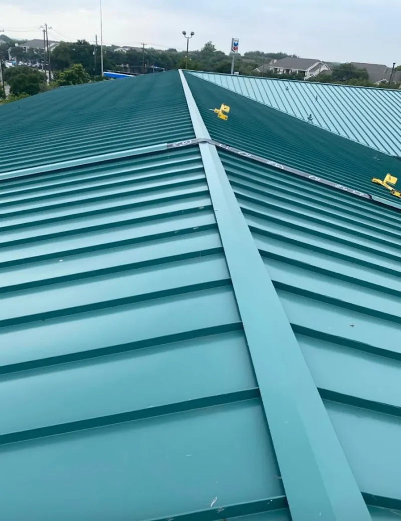 Green commercial metal roof ridge and valley for Metal Roof Repair in Estacada